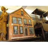 Large early 20th Century dolls house (a/f), 38ins high,