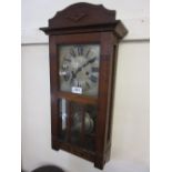 Early 20th Century Continental oak cased wall clock with silvered dial,