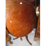 19th Century circular mahogany tripod table,