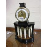 19th Century Continental ebonised automaton clock with alabaster pillars,