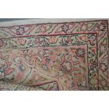 Turkish Persian pattern medallion and floral design carpet (faded),