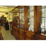 Similar good quality reproduction mahogany four door breakfront bookcase by Bevan and Funnell