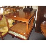 Pair of 20th Century walnut coffee tables with cane undertiers and pull-out slides