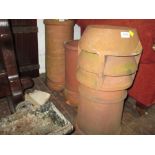 Three various terracotta chimney pots