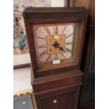 Art Deco grandmother clock having a square silvered dial with Roman numerals and two train movement