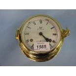 Modern gilt brass cased ships bulk head clock by Schatz,