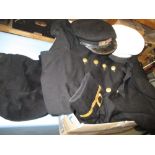 1950's British Royal Navy uniform having gold thread and cloth badge mounted cap, with jacket,