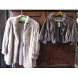 Ladies mid brown fur jacket together with a similar smaller jacket