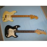 Hohner Stratocaster type electric guitar together with a similar Power Play guitar