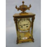 Late 19th or early 20th Century French gilt brass four glass library clock,