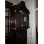 Antique oak longcase clock case with later carved decoration