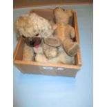 Small jointed teddy bear, a straw stuffed figure of a lamb and a pyjama case,
