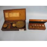 Oak cased set of late 19th / early 20th Century steel and brass sovereign scales with William A.