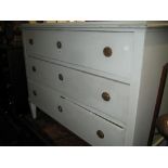 Late 19th Century Continental painted three drawer commode chest raised on square tapering supports