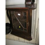 Small oak hanging corner cabinet with bar glazed panel door together with a small oval gilt framed