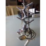 Aluminium jewellery tree with eleven silver chains and pendants,