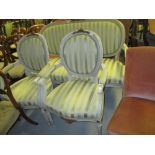 20th Century Continental painted three piece salon suite with upholstered backs and seats raised on