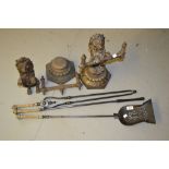 Set of three steel and brass fire irons and a pair of fire dogs in the form of standing lions (one