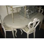 Mid 20th Century Continental painted oval extending dining table with an extra leaf together with a