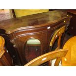 19th Century rosewood serpentine fronted credenza with a moulded top above a single drawer,
