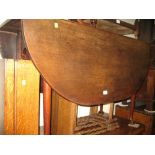 18th Century oak oval drop-leaf dining table on tapering supports with pad feet,