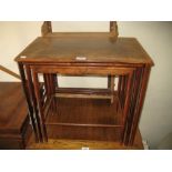 Nest of three mid 20th Century rosewood rectangular occasional tables