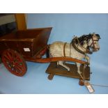 19th Century childs pull-along wooden horse together with a later cart