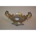 Continental (800 mark) embossed white metal fruit dish with glass liner and serpent end handles