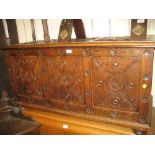 Late 19th or early 20th Century carved oak three panel coffer in antique style