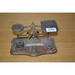 Pair of early 20th Century brass letter scales with weights
