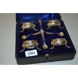 Cased set of four London silver salts with spoons in 18th Century style