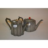 Two Britannia metal teapots