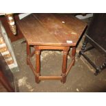 Oak hexagonal occasional table on baluster turned supports with stretchers,