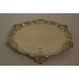 Sheffield silver salver with shaped Shell pattern rim on three shaped supports