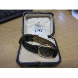 9ct yellow gold cased 1920's wristwatch (a/f) having later leather strap in an Asprey jewellery box