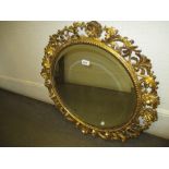 Late 19th / early 20th Century Florentine circular carved and gilded wall mirror