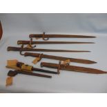 Group of five various early 20th Century bayonets,