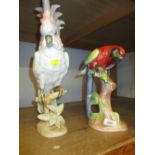 Modern Royal Dux figure of a cockatoo and a Dutch lustre glazed figure of a parrot