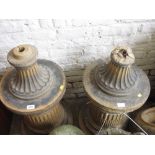 Pair of cast concrete pedestal garden urns on fluted columns,