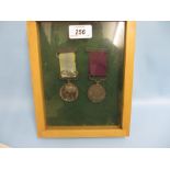 1854 Crimea medal bearing Alma clasp and a Long Service and Good Conduct medal awarded to 1339 PTE