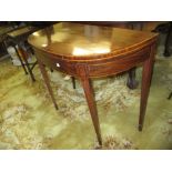 George III mahogany crossbanded and line inlaid D-shaped fold-over card table,