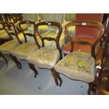 Set of four 19th Century rosewood balloon back dining chairs on cabriole front supports (a/f),