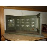 Unusual German painted wooden Christmas shop model inset with multiple drawers and mirrors,