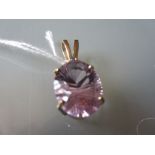 Large 9ct yellow gold pale amethyst and small aquamarine set pendant