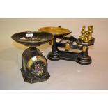 Pair of painted toleware kitchen scales with floral decoration,