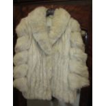 Ladies half length fox fur coat by Saga