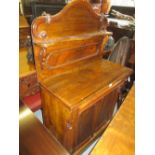 Victorian walnut chiffonier with a shelf back above a drawer and cupboard