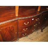 Early 20th Century mahogany dining room suite comprising: oval wind-out extending dining table with