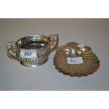 Birmingham silver oval floral embossed two handled sugar bowl and a London silver shell form butter