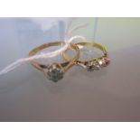 18ct Gold three stone diamond ring together with a 9ct gold solitaire ring